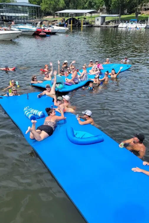all the friends and family on a floating water mat